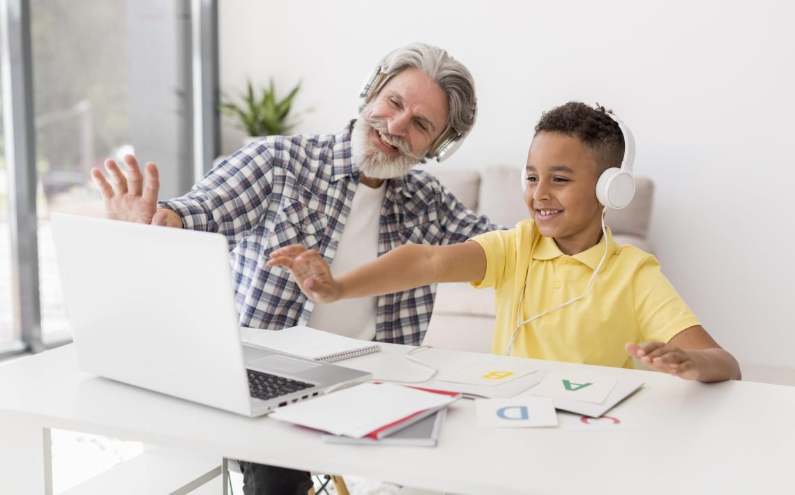 teacher-student-waving-laptop